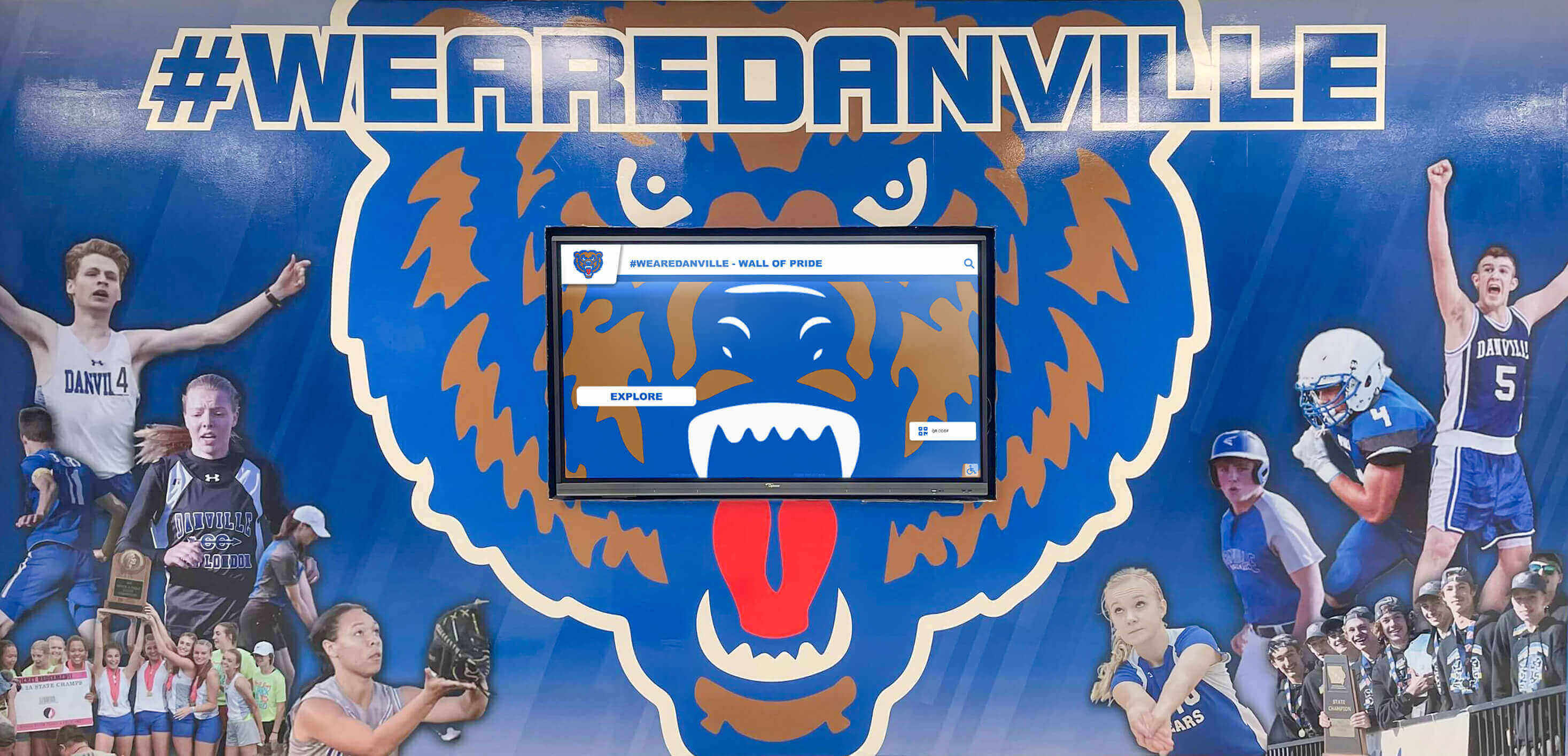 School athletic mural with integrated digital display for program information Athletic program display system