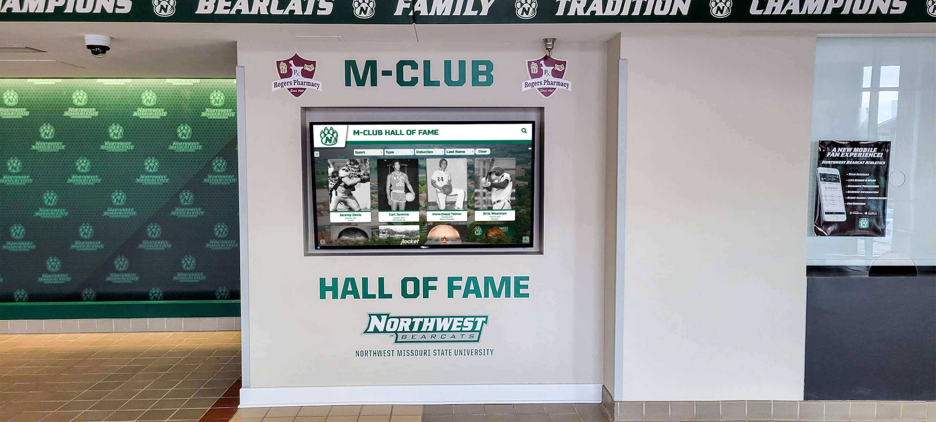 Alumni hall of fame display with digital screen