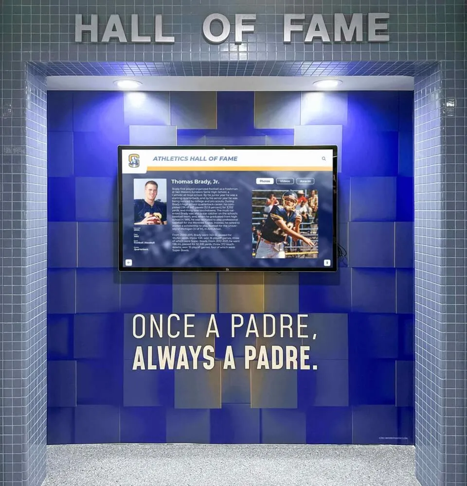 Padres hall of fame blue tile display with digital recognition screen — award records loaded through seasonal imports into a PostgreSQL cluster generate WAL activity tracked cluster-wide in the pg_stat_wal view Padres hall of fame blue tile display with digital screen reading “Once a Padre” showing recognition content in a school athletic facility