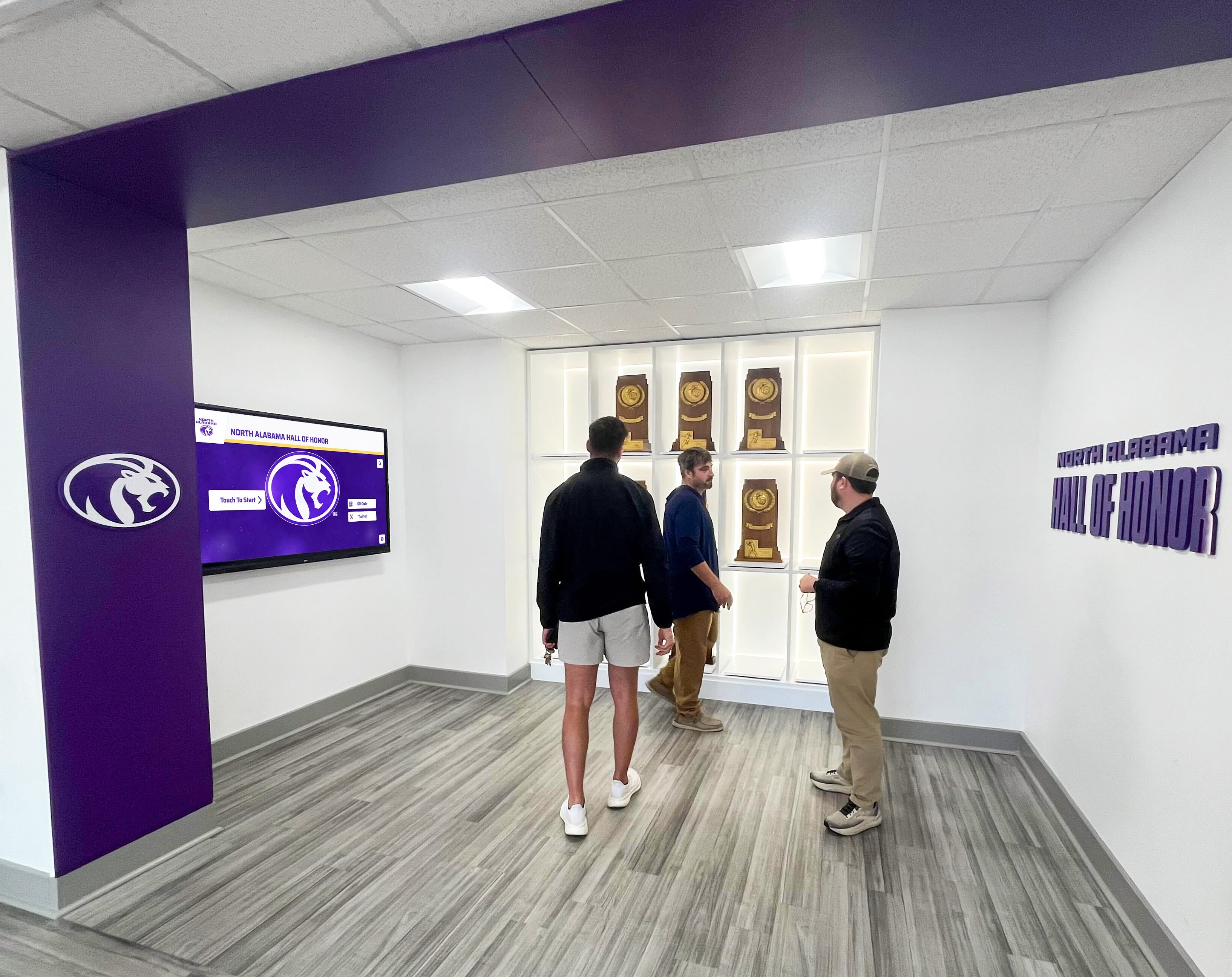 Trophy display with visitors