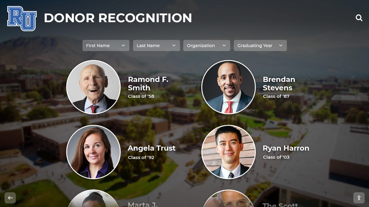 University donor recognition display with alumni portraits Donor recognition wall